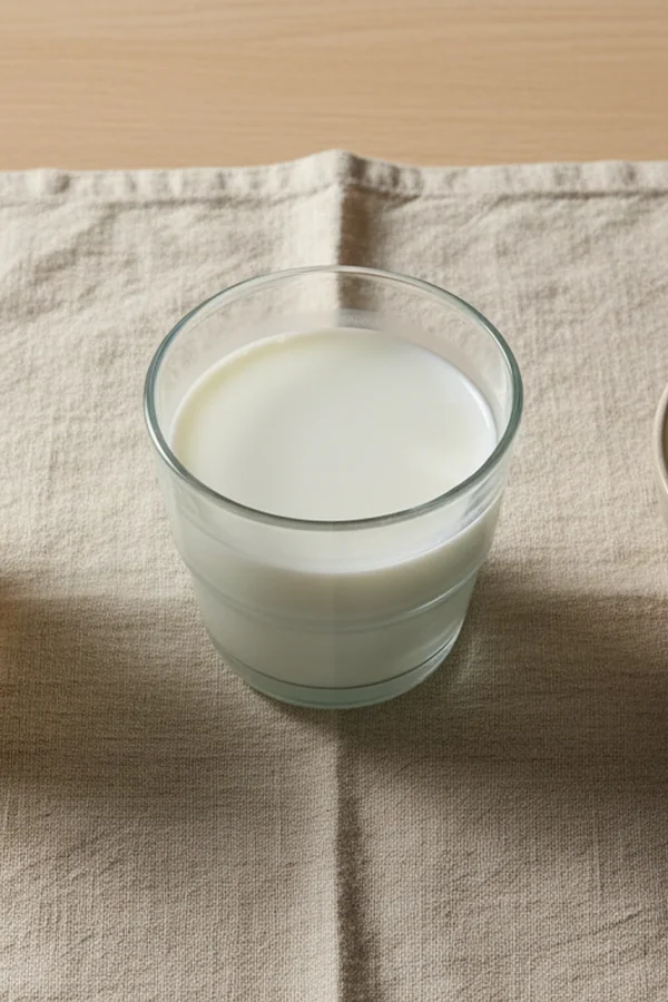 Milk glasses representing the skim milk acne paradox